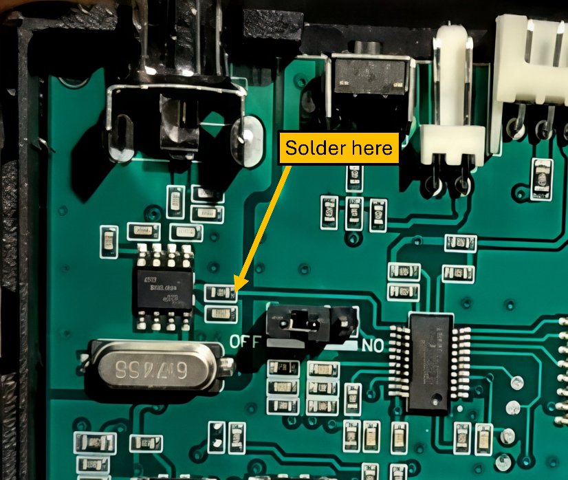 Soldering a tap wire onto the resistor at the start of the pin-1 trace, rather than the microcontroller pin itself.