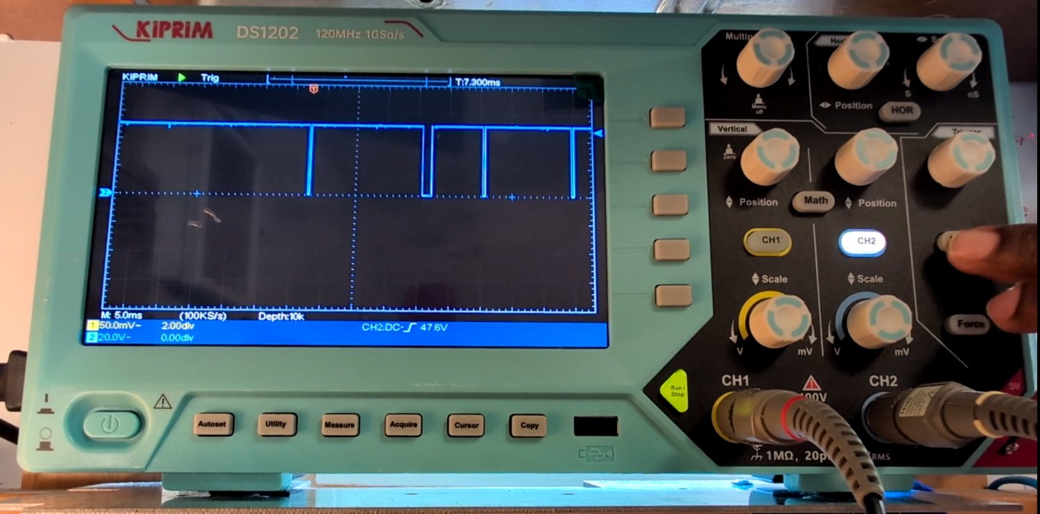 An example of a brief random noise glitch pulling the signal low without any button press.