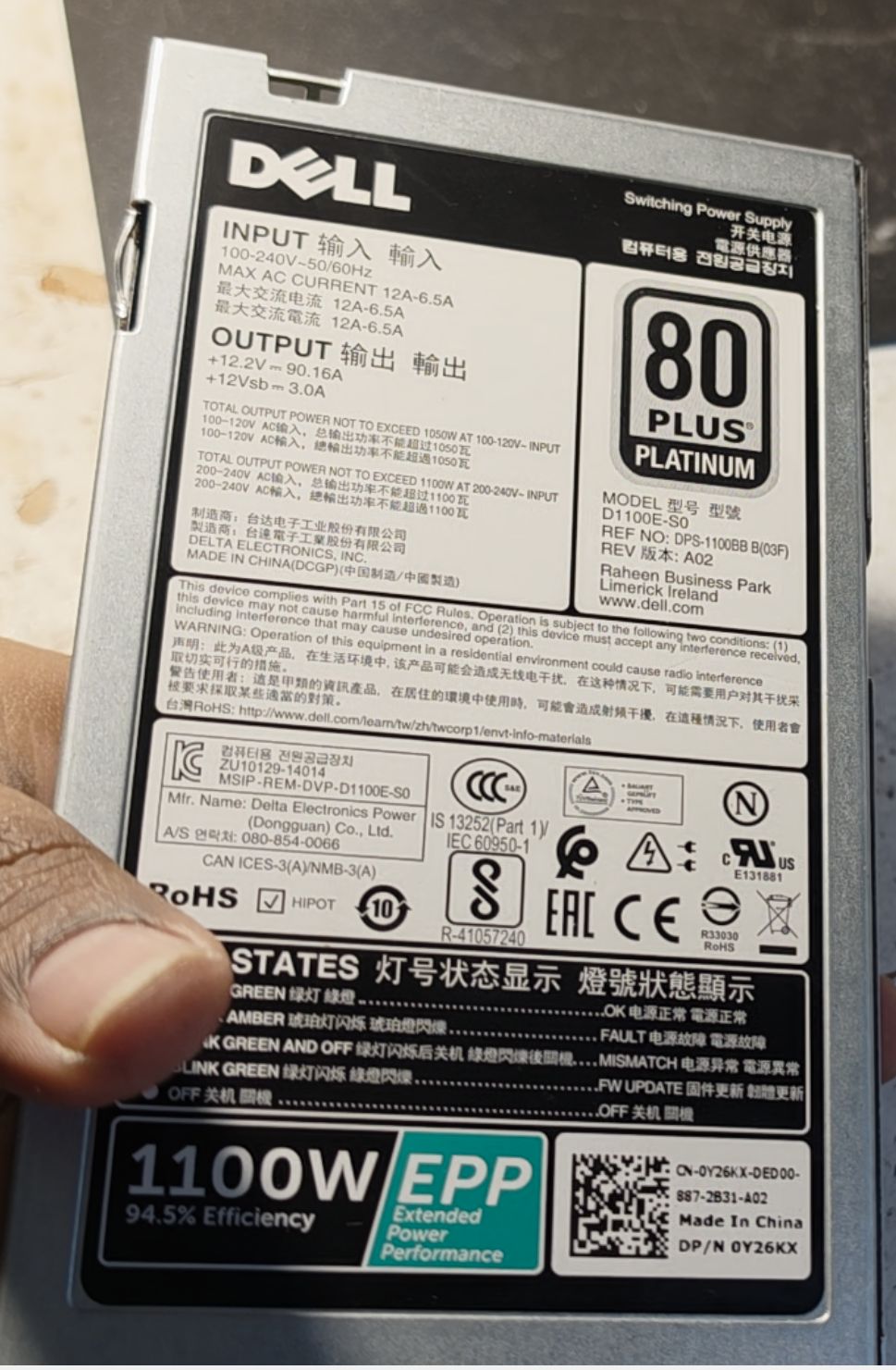 The label on the underside of the D1100E-S0: 12.2 V @ 90.16 A, 1100 W, 80 PLUS Platinum.