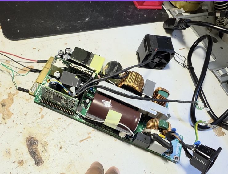 Separating the main circuit board from the housing.