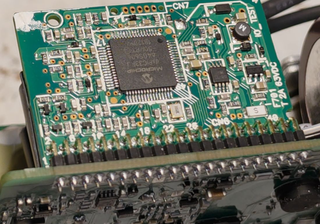 Probing ADC pins on the daughterboard, watching for a reading near 2.7 V.