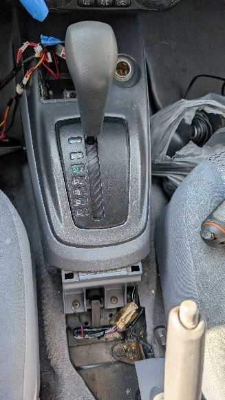 Photo of the soldered ring terminal connected to the chassis ground screw.