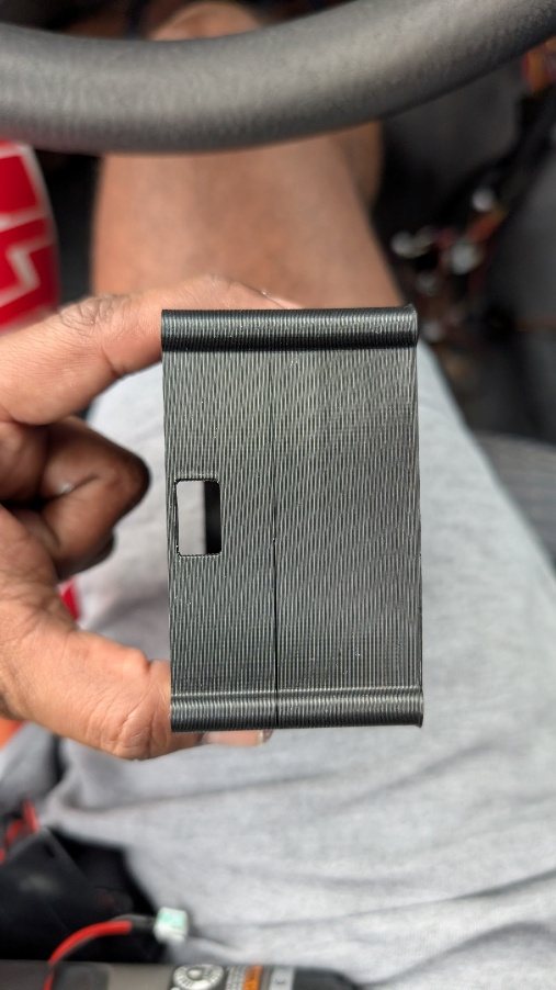 The enclosure's USB programming port opening.