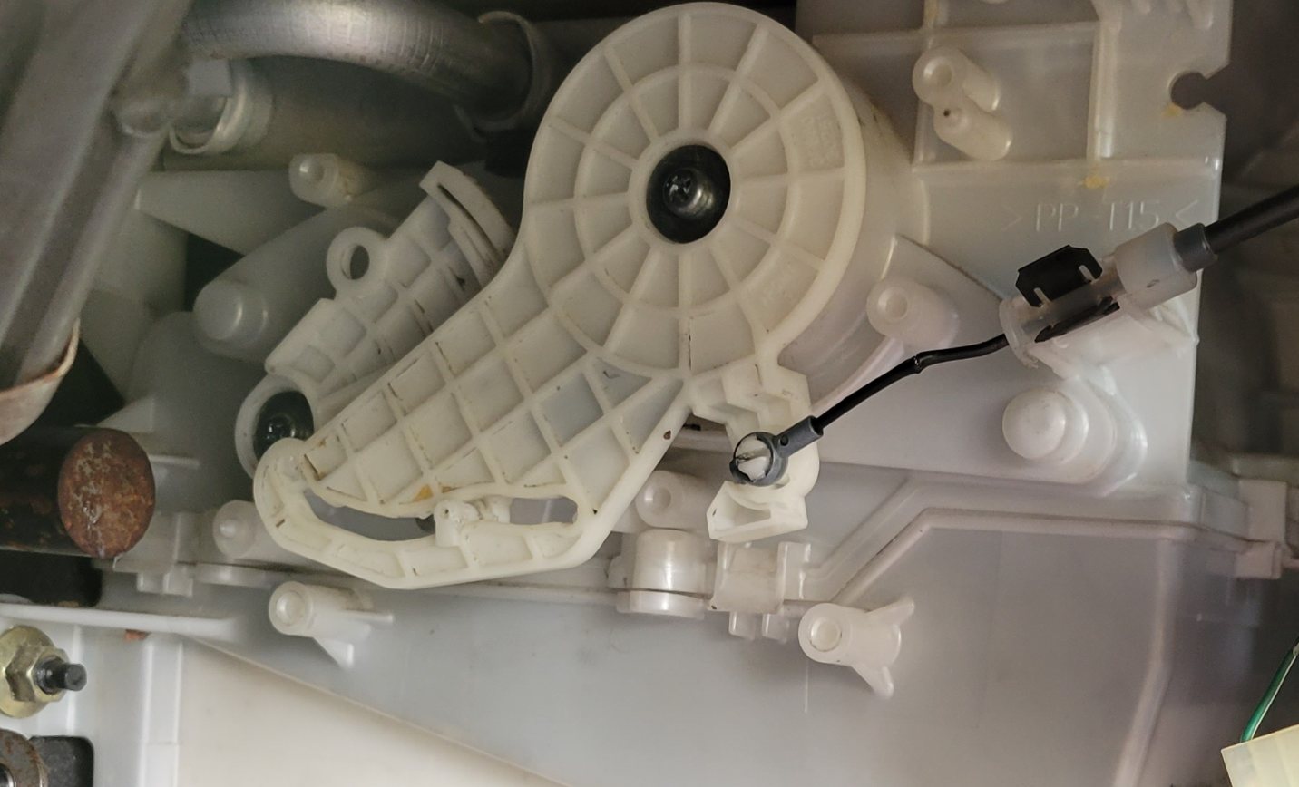 The same amplifying mechanism viewed from under the dashboard.