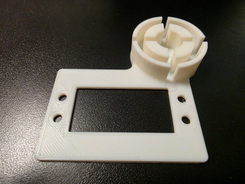 Another angle of the printed test skeleton, showing the split alignment pin.